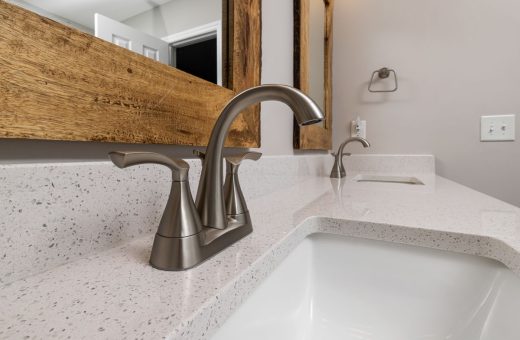 Kohler faucet on a stone vanity