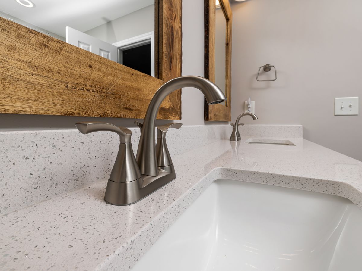 Kohler faucet on a stone vanity