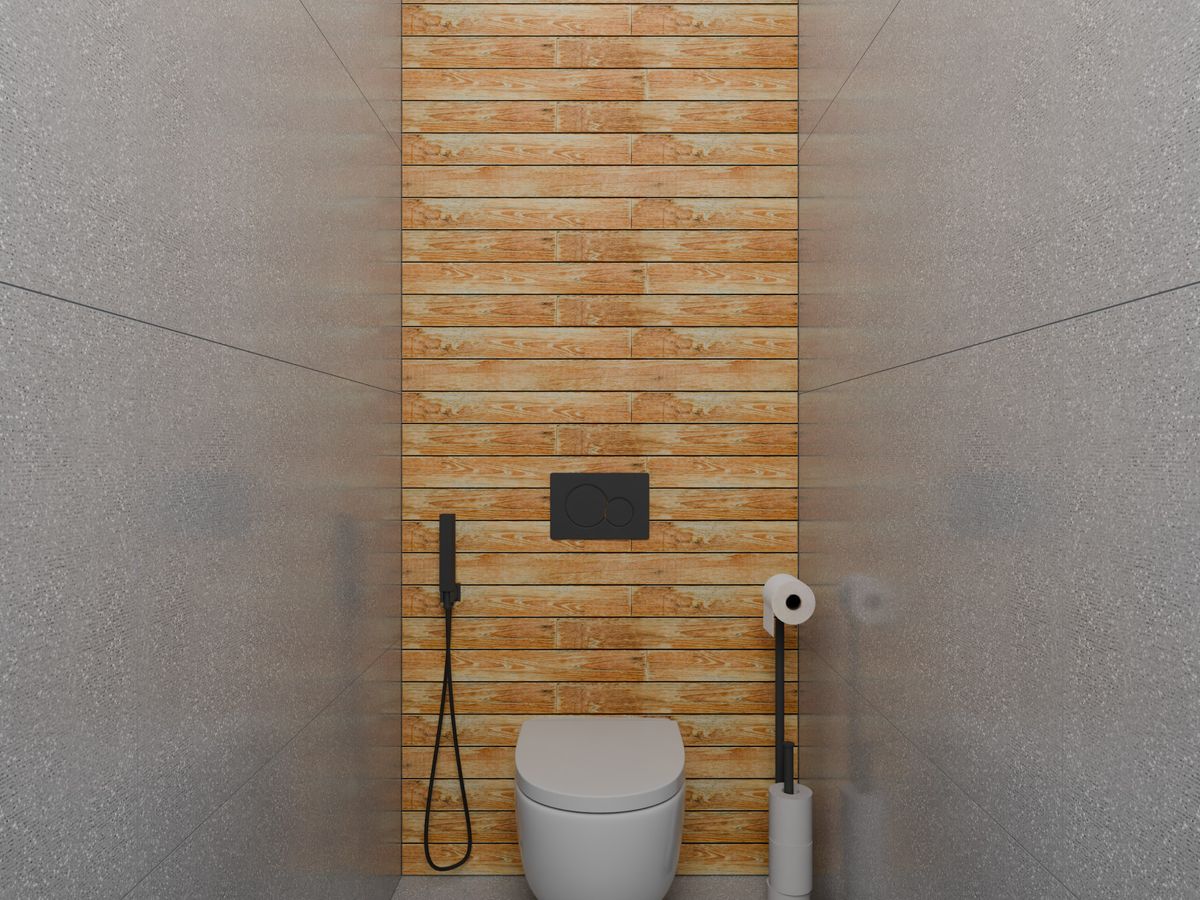 American Standard commode in a tiled bathroom