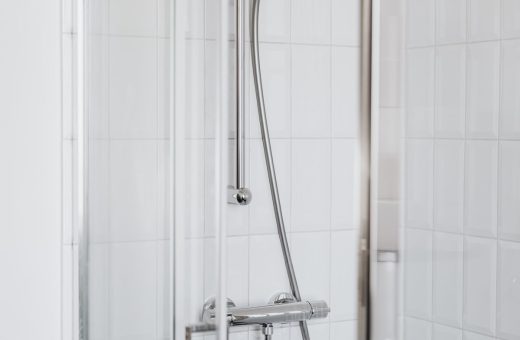 Grohe shower system on a tiled wall