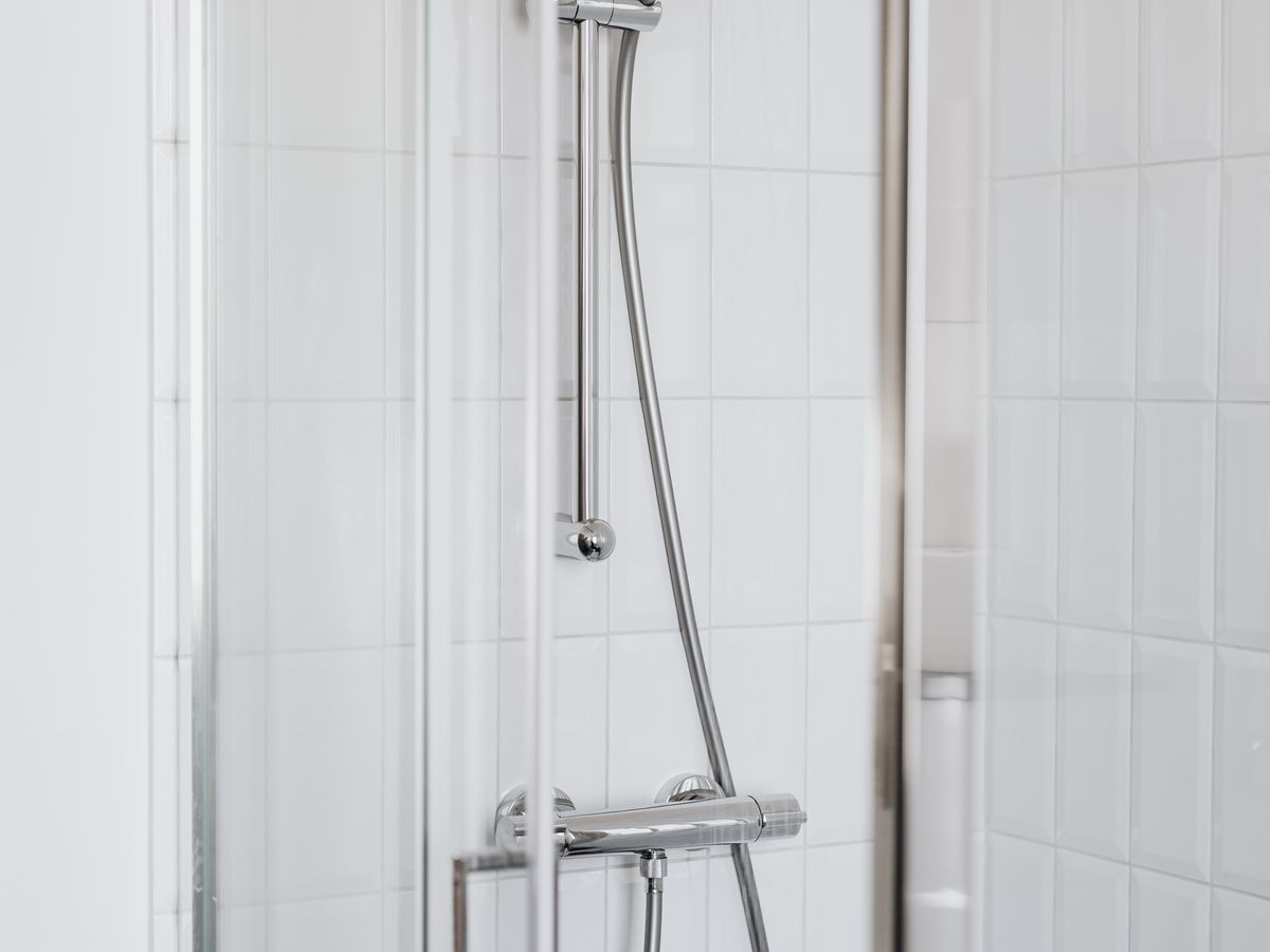 Grohe shower system on a tiled wall
